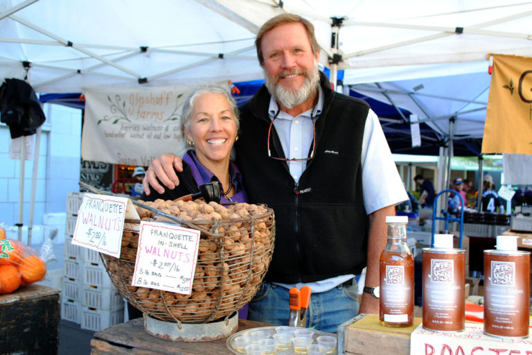 Maria and Larry at Glashoff Farms's stand at the Ferry Plaza Farmers Market.