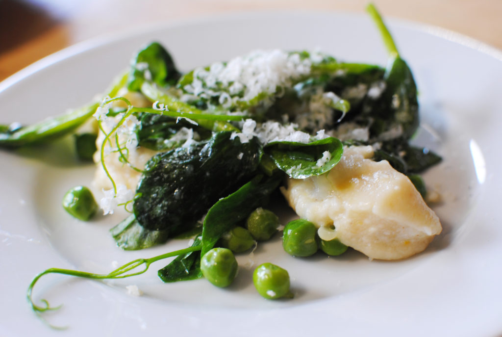 Ricotta Gnocchi with English Peas, Spring Onions, and Pea Tendrils