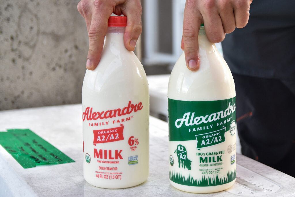Two bottles of Alexandre Family Farms milk