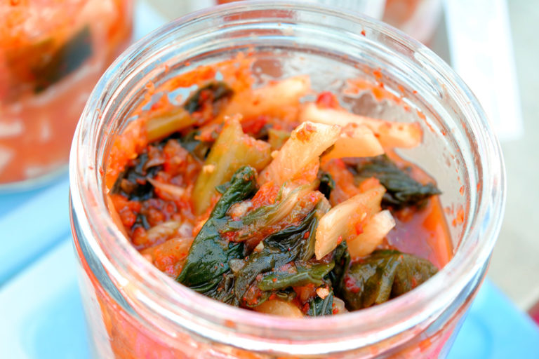 vegan kimchi in an open jar
