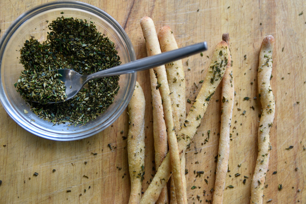 Grissini breadsticks and herb topping
