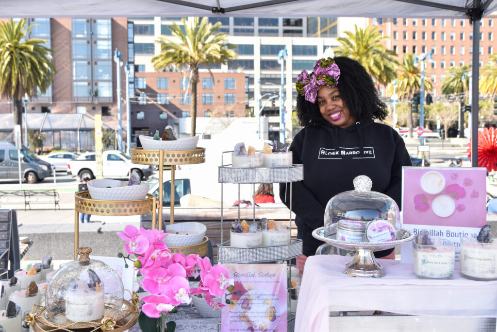 Nicole Thrower poses at Bismillah Boutique's stand at Foodwise's Pop-Ups on the Plaza at the Ferry Plaza Farmers Market in San Francisco