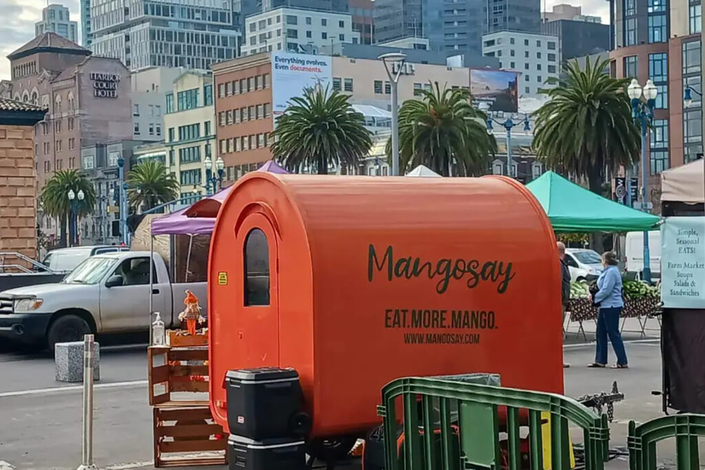 Mangosay orange cart with FPFM in the background