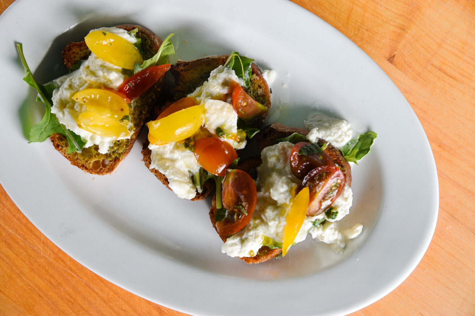 Bruschetta With Stracciatella Pesto And Tomatoes Foodwise