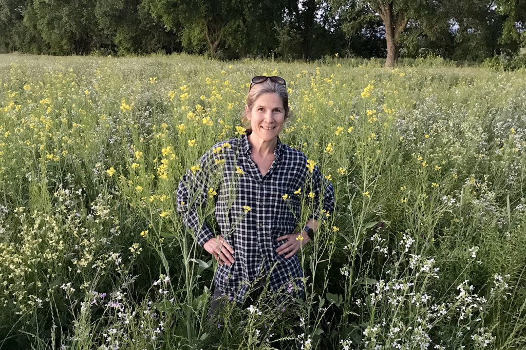 Raquel Krach stands in a field at Massa Organics Farm