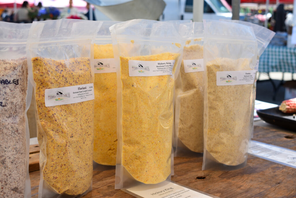 Clear bags of cornmeal and hominy